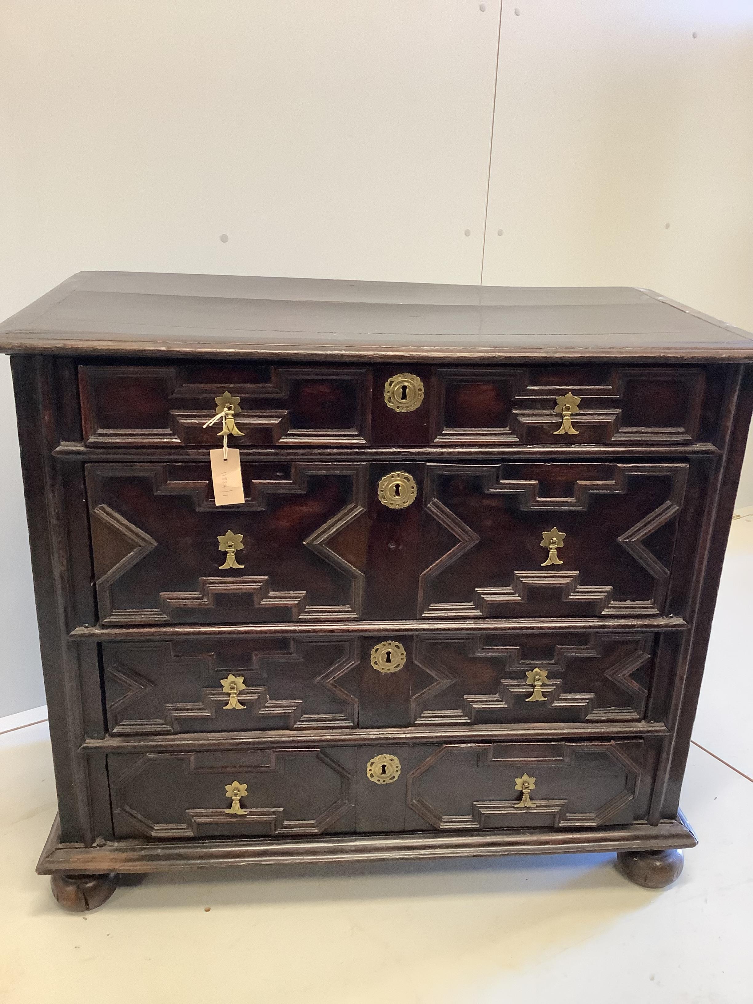 A late 17th /early 18th century oak four drawer chest, width 98cm, depth 50cm, height 86cm